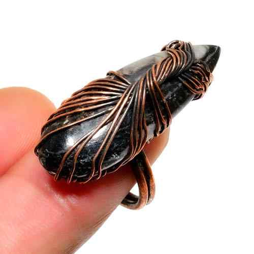Guardian’s Embrace – Black Tourmaline Copper Ring