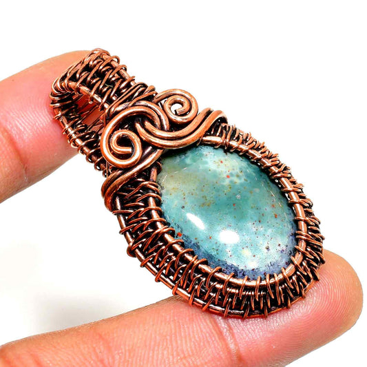 Celestial Embrace – Aqua Stone Copper Pendant