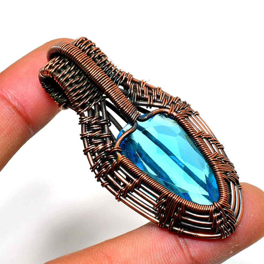 Azure’s Embrace – Blue Topaz & Copper Pendant