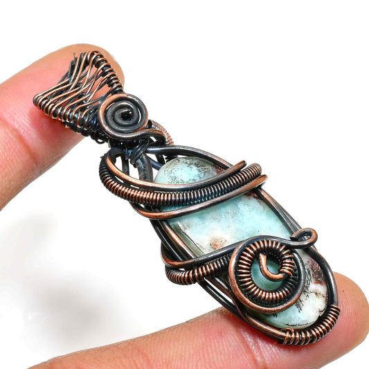 Ocean’s Embrace – Aquamarine Copper Pendant