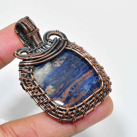 Serenity’s Embrace – Sodalite Copper Pendant