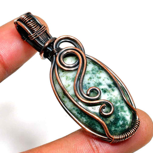 Gaia’s Embrace – Jade & Oxidized Copper Pendant