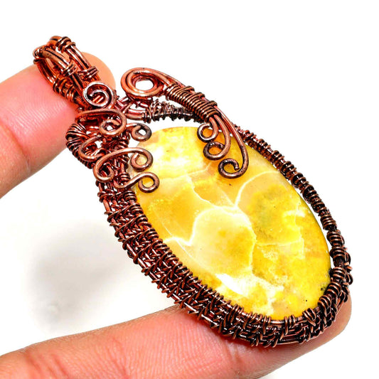 Solara’s Radiance – Honey Calcite Copper Pendant