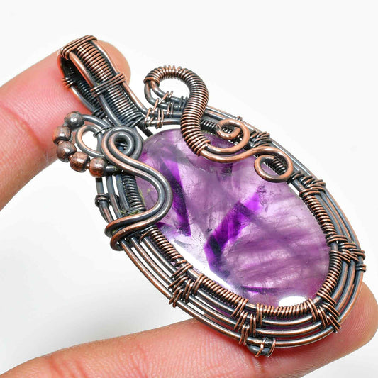 Ezra’s Veil – Handwrapped Amethyst & Oxidized Copper Pendant