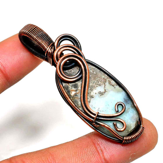 Reverie’s Embrace – Larimar Copper Pendant