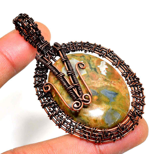 Gaia’s Embrace – Earthstone Copper Pendant