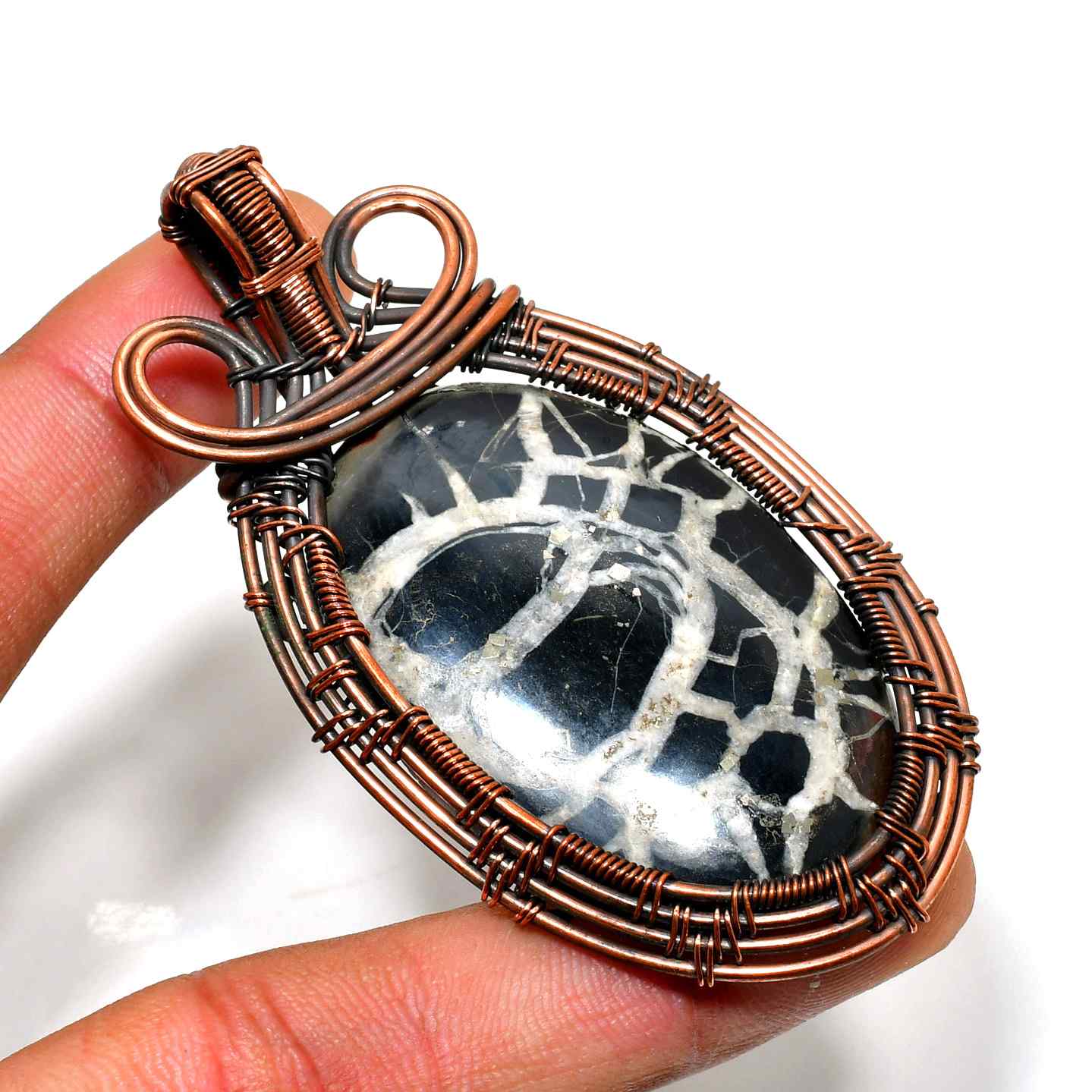 Guardian’s Embrace – Black Onyx Copper Pendant