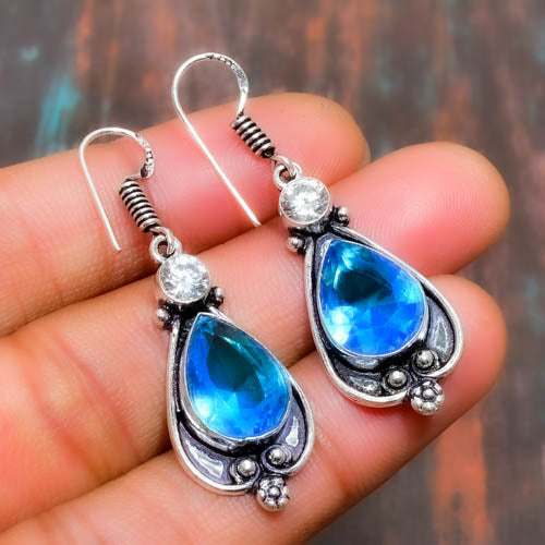 Azure Muse – Sterling Silver Blue Topaz Earrings