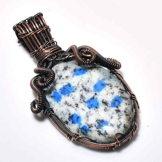 Celestial Calm – Copper-Wrapped Blue Gem Pendant