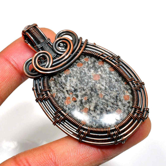 Glimmering Dawn – Snowflake Obsidian Copper Pendant