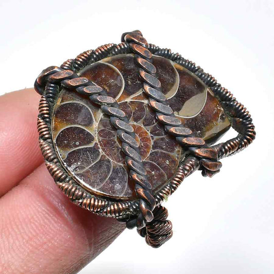 Terra’s Embrace – Fossilized Stone Copper Pendant