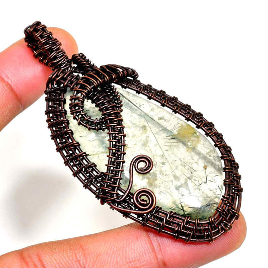 Earthbound Serenity – Copper-Wrapped Crystal Pendant