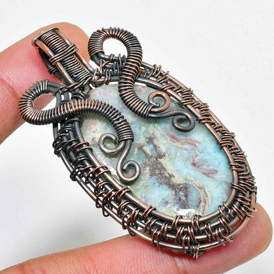 Serenity’s Embrace – Aqua Stone Copper Pendant