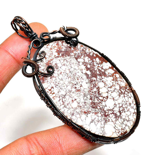 Earthbound Elegance – Copper-Wrapped Stone Pendant
