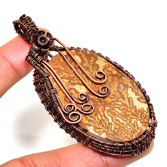 Earth’s Embrace – Copper-Wrapped Natural Stone Pendant