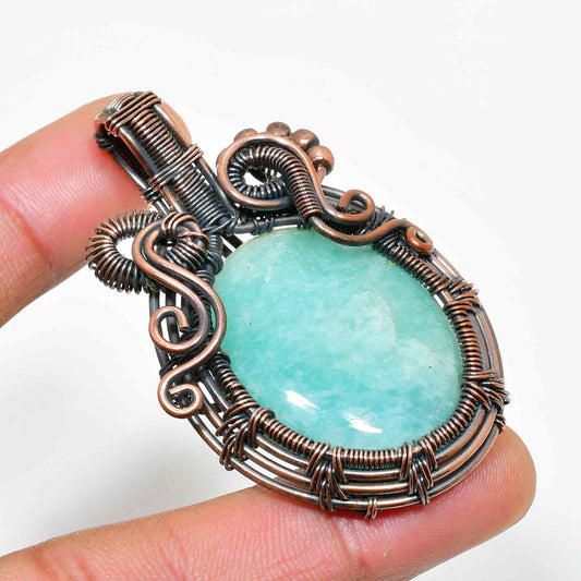 Serenity’s Whisper – Aqua Aura Copper Pendant