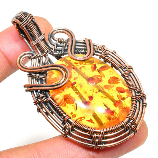 Amber Essence – Oxidized Copper Wrapped Amber Pendant