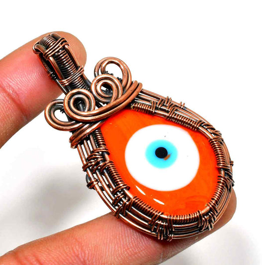 Soleil’s Shield – Orange Evil Eye Copper Pendant