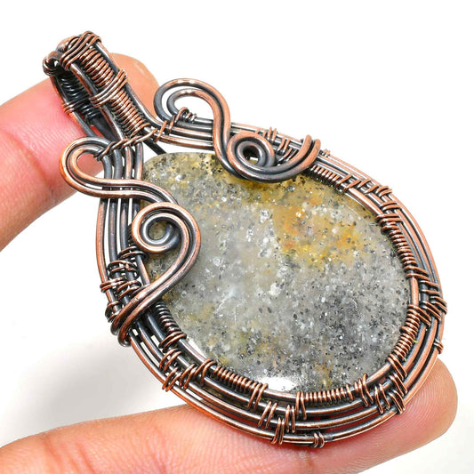 Nature’s Embrace – Copper-Wrapped Grounding Stone Pendant