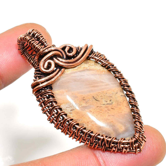 Serenity’s Embrace – Copper-Wrapped Gemstone Pendant