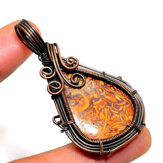 Ember’s Embrace – Amber & Copper Pendant