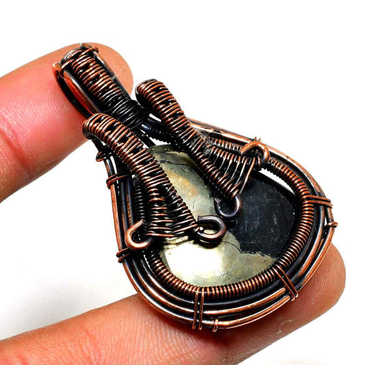 Gaia’s Embrace – Copper-Wrapped Crystal Pendant