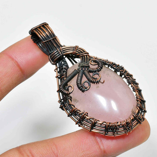 Harmonia’s Embrace – Rose Quartz Copper Pendant