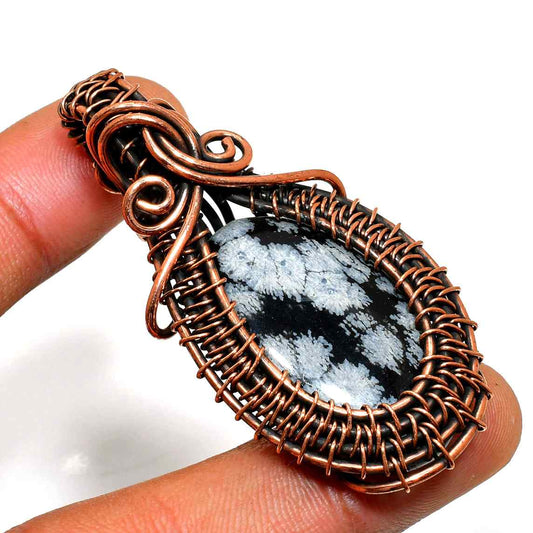 Eira’s Embrace – Snowflake Obsidian Copper Pendant