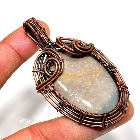 Gaia’s Embrace – Copper-Wrapped Natural Stone Pendant