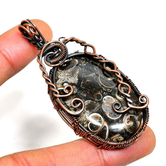 Terra’s Equilibrium – Fossilized Stone Copper Pendant