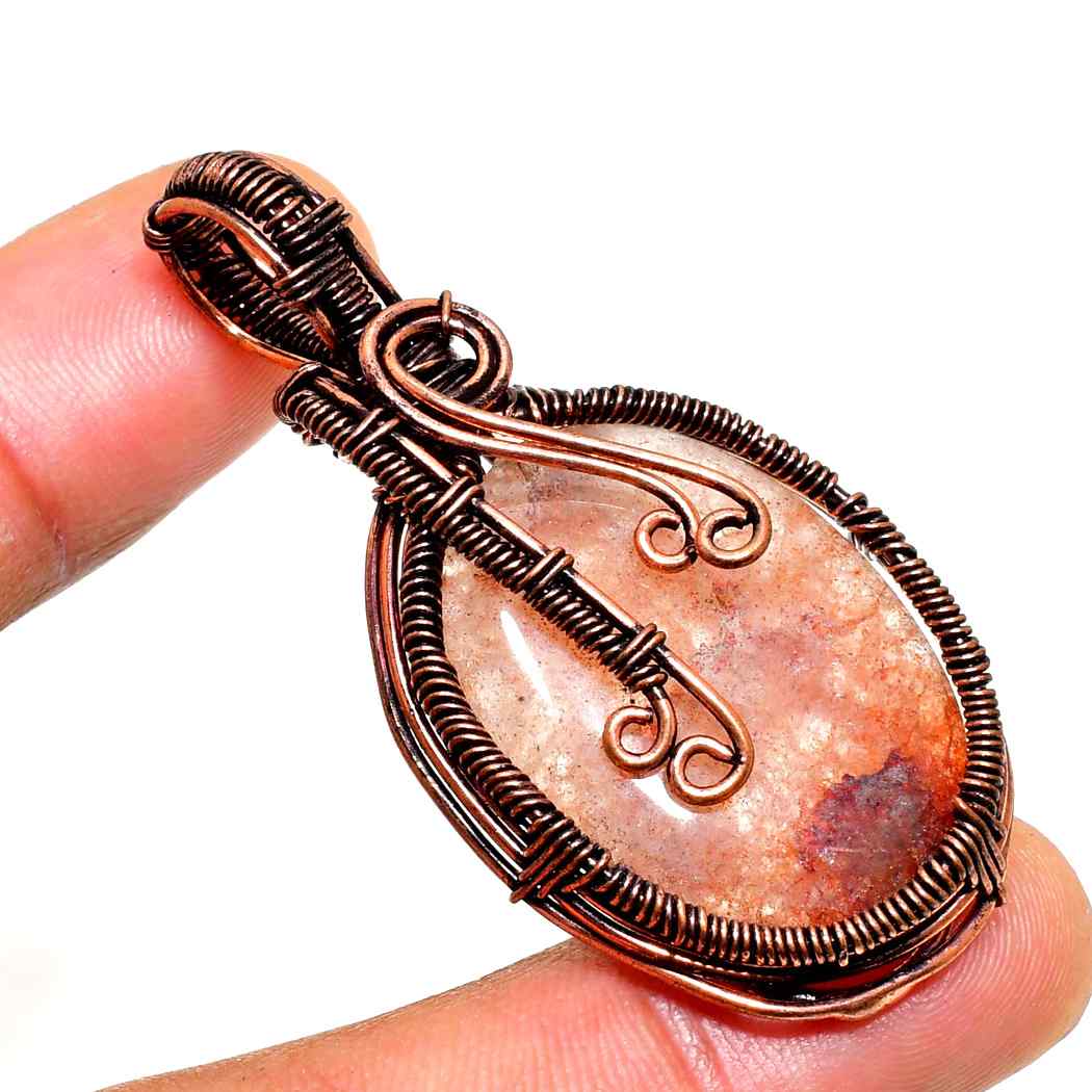 Ember’s Embrace – Sunstone Copper Pendant