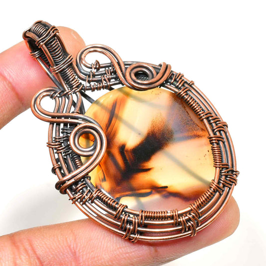 Earthen Embrace – Oxidized Copper Stone Pendant