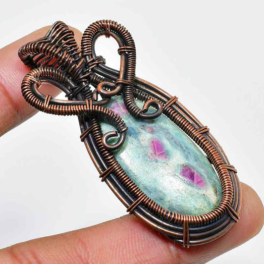 Serenity’s Embrace – Copper-Wrapped Healing Stone Pendant
