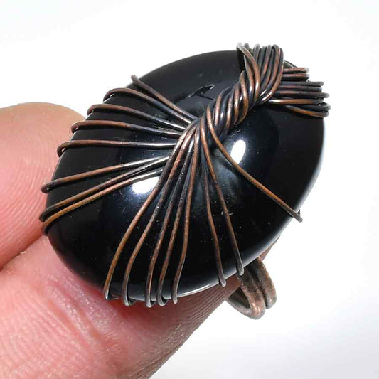 Guardian’s Embrace – Obsidian Copper Ring