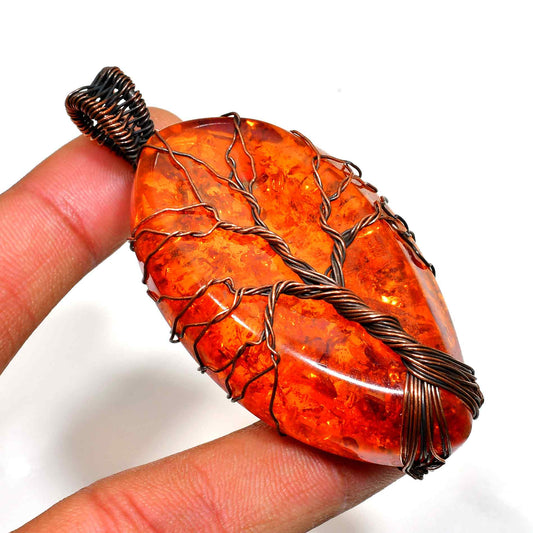 Ember’s Embrace – Amber & Oxidized Copper Pendant