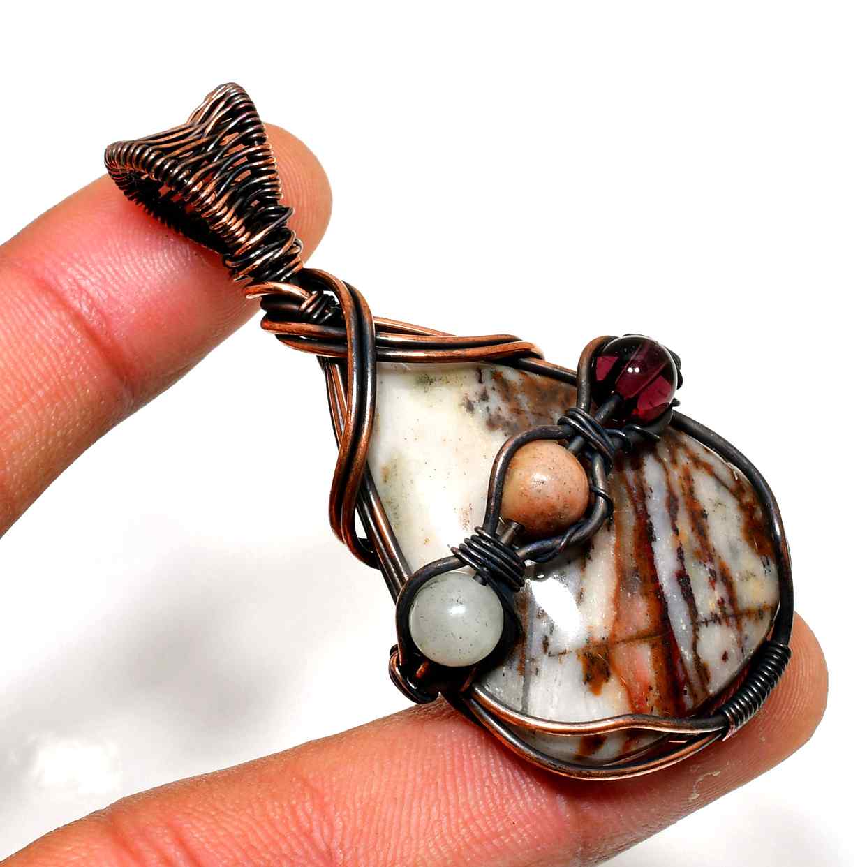 Ember’s Embrace – Baltic Amber & Copper Pendant