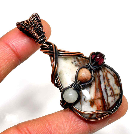 Ember’s Embrace – Baltic Amber & Copper Pendant