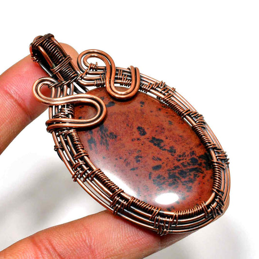 Earth’s Embrace – Red Jasper Copper Pendant