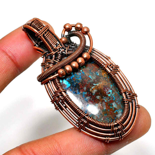 Azure’s Embrace – Turquoise Copper Pendant