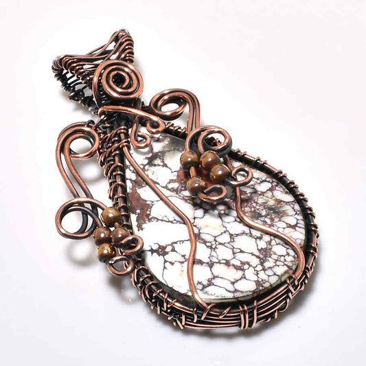 Serenity’s Spiral – Calming Stone Copper Pendant
