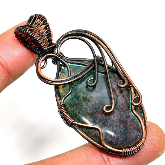 Gaia’s Embrace – Green Stone Copper Pendant