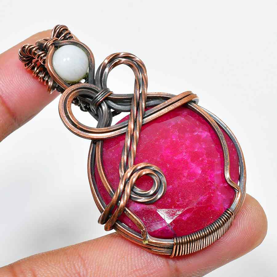 Ember’s Embrace – Hand-Wrapped Ruby Pendant