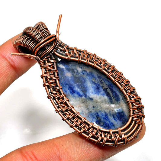 Clarity’s Embrace – Sodalite Copper Pendant