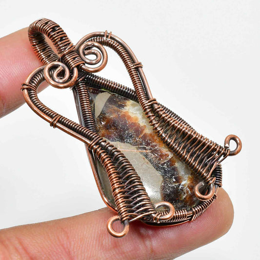 Gaia’s Embrace – Oxidized Copper Stone Pendant