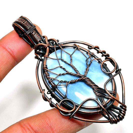 Serenity’s Embrace – Blue Lace Agate Copper Pendant