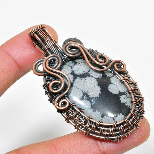 Shadow’s Embrace – Obsidian Copper Pendant