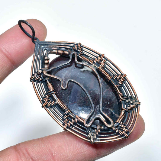 Dolphin’s Embrace – Amethyst Copper Pendant
