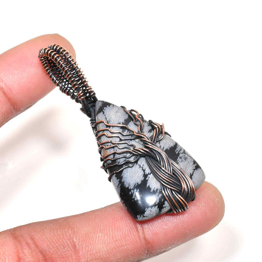 Raven’s Embrace – Obsidian Copper Pendant