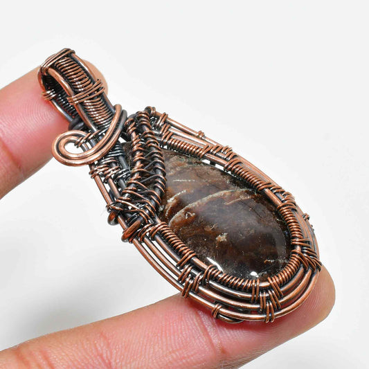 Terra’s Embrace – Oxidized Copper Stone Pendant