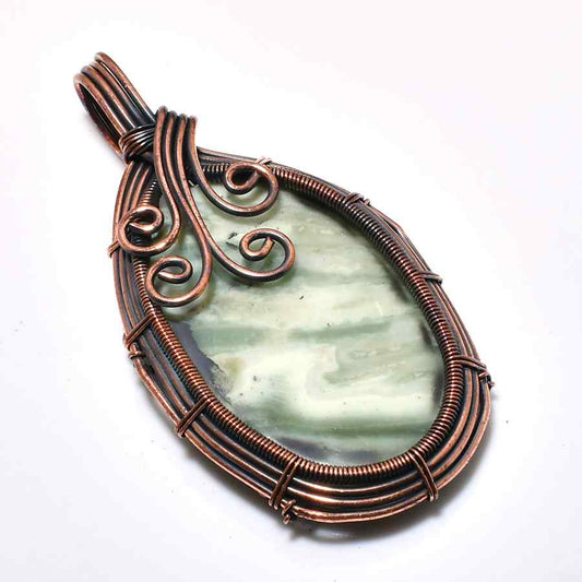 Harmony’s Embrace – Jade & Copper Pendant